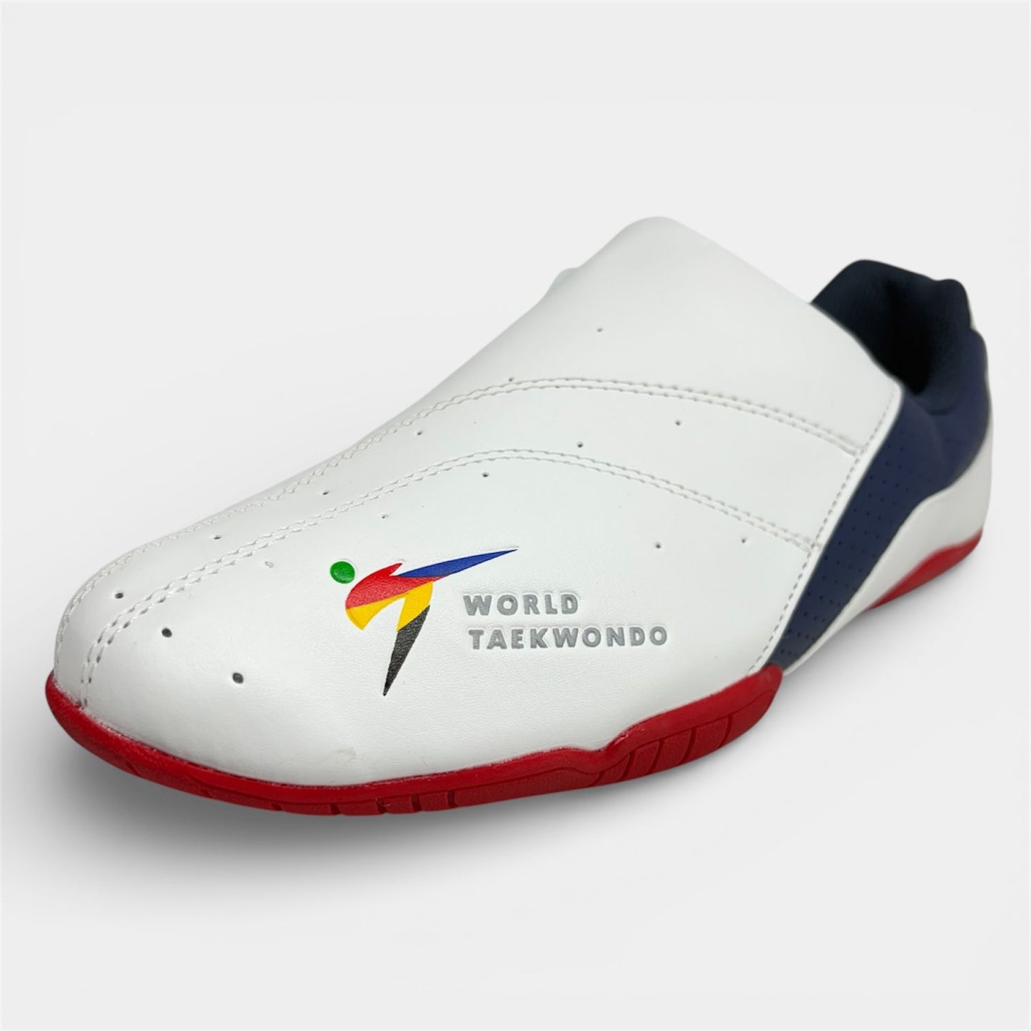 White taekwondo shoe with colorful logo on a light gray background